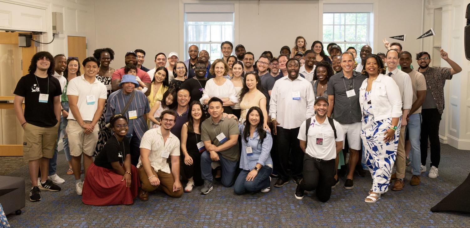 Large group of people smiling for the photo